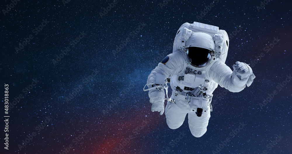 Poster Spaceman flies in open space with stars and galaxies. Copy space for design and text.