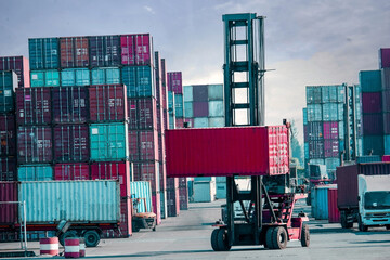 Container stacks and trucks and container forklifts Industry and Transportation Perspectives trade and investment