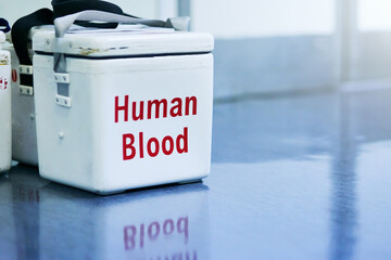 Were nothing without it. Shot of a box containing blood samples on a hospital floor.