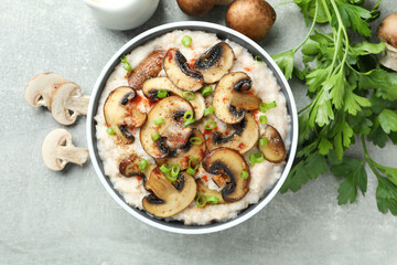 Concept of tasty food with risotto with mushrooms, top view