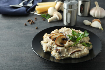 Concept of tasty food with risotto with mushrooms, space for text