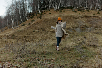 tourist in autumn clothes nature trees travel life style