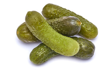 Tasty Whole green cornichons isolated on a white background