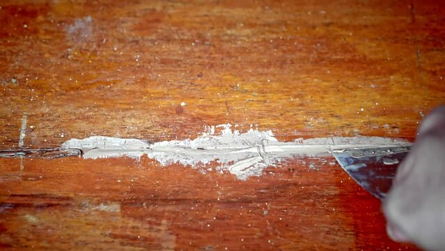 repair wooden floor, wood filler.	