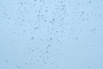 Raindrops on window, bubbles background