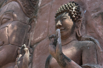Fototapeta na wymiar The buddha ancient at the Thailand temple. Laterite buddha.