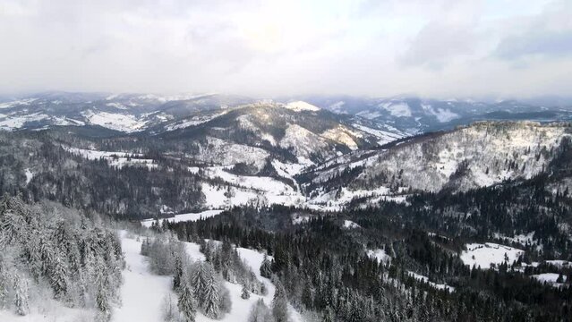 aerial view of sunrise above winter carpathian mountains