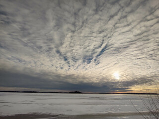 Spectacular sunset over  frozen lake in the Sweden in winter