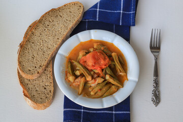 Bamya, Turkish traditional food. (Turkish cuisine) Homemade Food Okra in Plate. Organic Food.