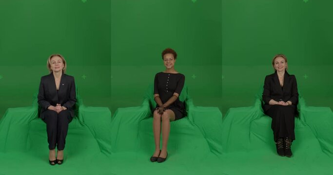 GREEN SCREEN CHROMA KEY Front view of female woman spectators wearing formal attire watching performance on stage. Crowd replication for theater, opera, ballet. Unkeyed chairs to keep shadows