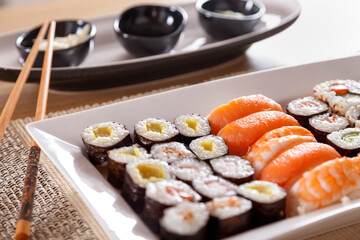 Sushi Plate with Proper Sticks and Appetizers