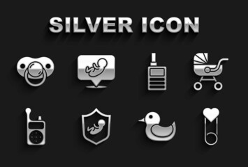 Set Baby on shield, stroller, clothes pin, Rubber duck, Monitor Walkie Talkie, dummy pacifier and icon. Vector