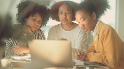 Group of women studying e-learning about taxes
