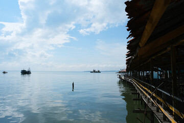 The beautiful hot afternoon blue seaside next to Kampung Pulak, Sandakan, sabah.