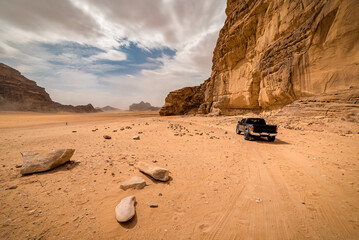 Desert safari - offroad vehicle in the UNESCO world heritage site Wadi Rum desert