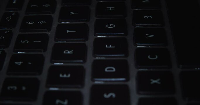 Black Keyboard Of Laptop Computer. - close up, tilt down