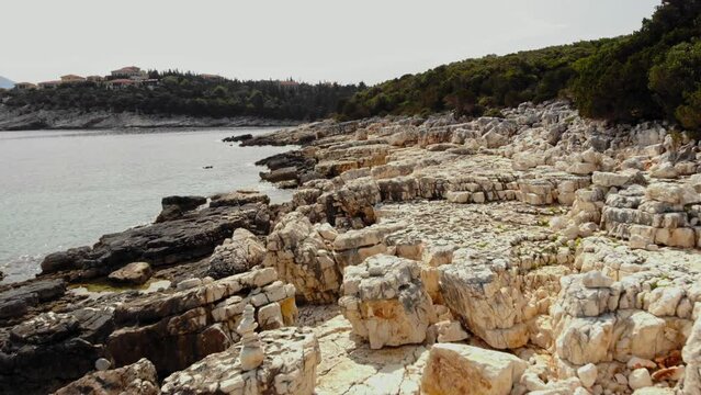 Rocky Beach Of Paralia Emplisi In Greece - aerial shot