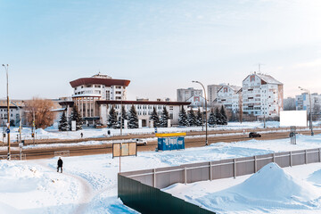 Panorama of the winter city overlooking the intersection of streets. Togliatti, Russia - 4 Jan 2022