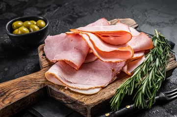 Fotobehang Pork ham slices on cutting board, Italian Prosciutto cotto. Black background. Top view © Vladimir