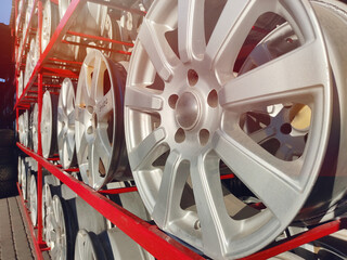 Used rims from cars in a row. Second hand - resale. Copy space. day
