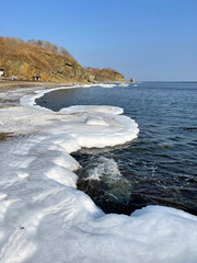 The coast of the Sea of Japan in the vicinity of Vladivostok in winter. Russia