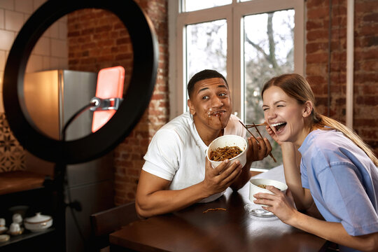 Girl laughing from guy during video challenge