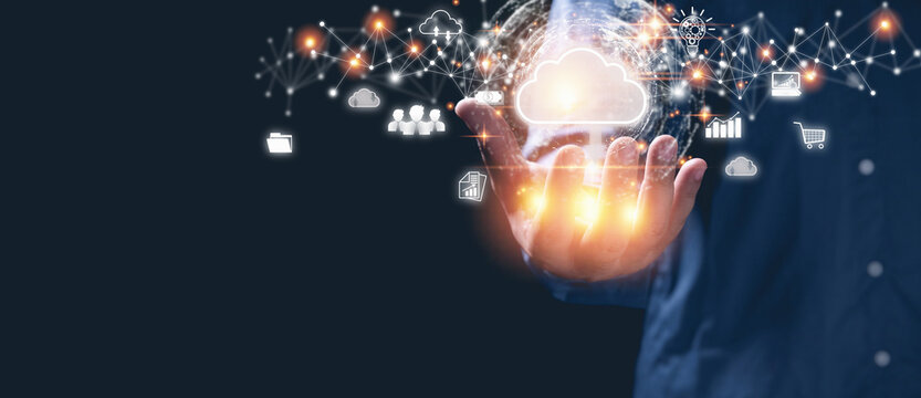 Businessman holding icon cloud computing with network and data information in hand. Protection database, business, internet digital network, technology concept.