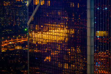Skyscrapers with glass walls at night