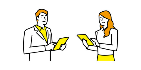 タブレット端末を操作する男性と女性