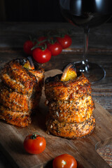 Salmon fillet rolls with a slice of orange inside