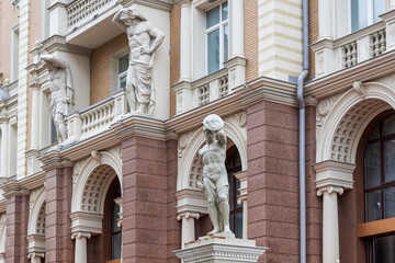 Facade of building decorated with copies of ancient sculptures in Kazan, Russia