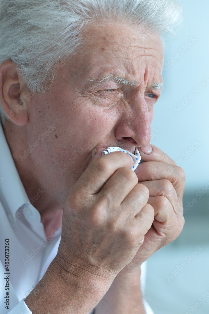 Sticker Portrait of sad sick senior man