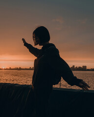 silhouette of a happy girl on the background of the