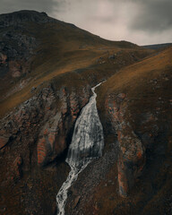 Mystical waterfall in the mountains