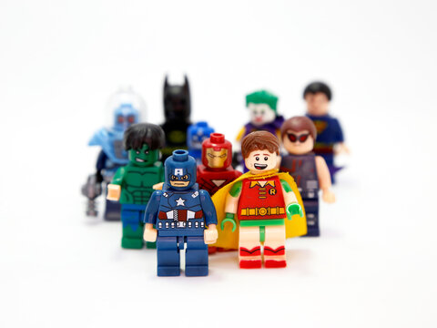 Lego Marvel. Superheroes and villains. Captain America, Robin, Hulk, Joker, Ironman, Batman, Catwoman, Superman, Venom. Toys for childrens. Small plastic figures. Fight of good against evil. Isolated.