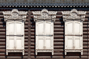 Window-frames and shutters of a traditional Siberian wooden house