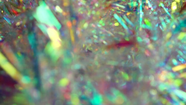 Abstract glittering hologram background. Shooting in