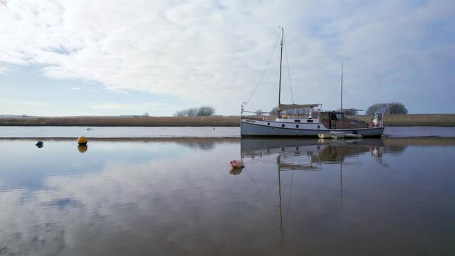 Boat on the River Exe in Topsham from a drone, Exeter, Devon, England, Europe