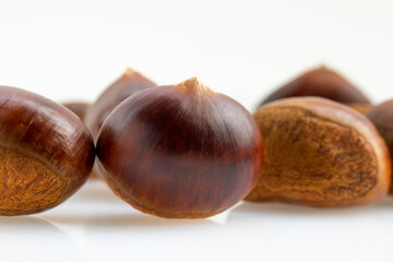 Autumn delicacies, chestnuts, white, white background