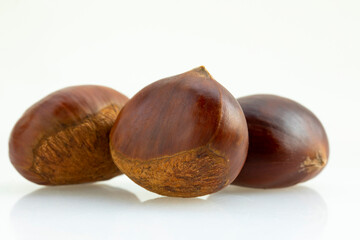 Autumn delicacies, chestnuts, white, white background