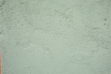 Khaki or grey green textured plastered wall, background, patter, mock up.