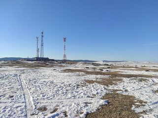 Obraz premium ground with snow against the blue sky
