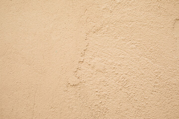 Powder color, beige texture plastered wall, background, pattern, mock up.