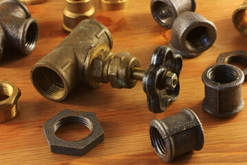 Old brass plumbing fittings for the water pipe
