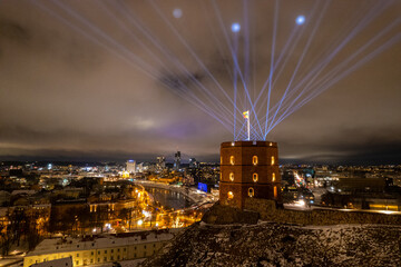 Aerial winter night view of snowy Vilnius old town, Lithuania