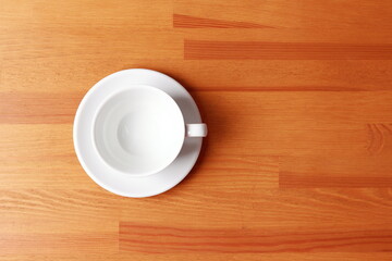 cup of coffee on wood table
