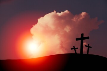 Crucifixion and resurrection, crosses against the sunset background