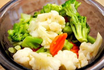 A Bowl of Broccoli, Cauliflower and Carrots in a Glass Bowl