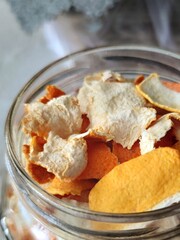 Homemade candied orange peel after the drying process. Dry orange peels in a ja