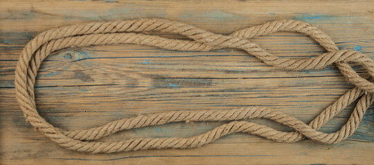 Fototapeta na wymiar wood background with rope
